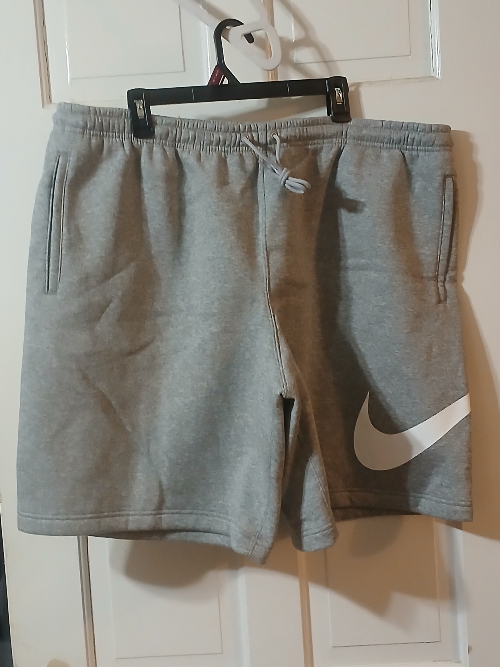 Nike Men's Gray Athletic Shorts with White Swoosh